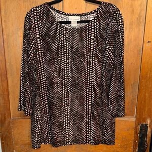 Rebecca Malone has Black and Pink Patterned Tunic Top